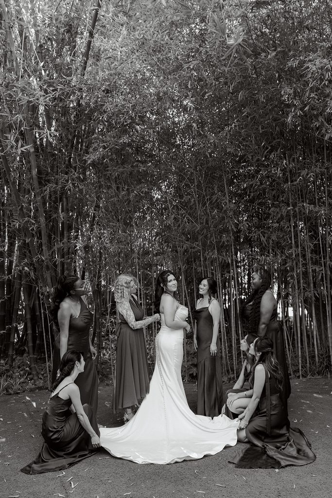 Bride and bridesmaids among the bamboo at Hartley Botanica, black and white