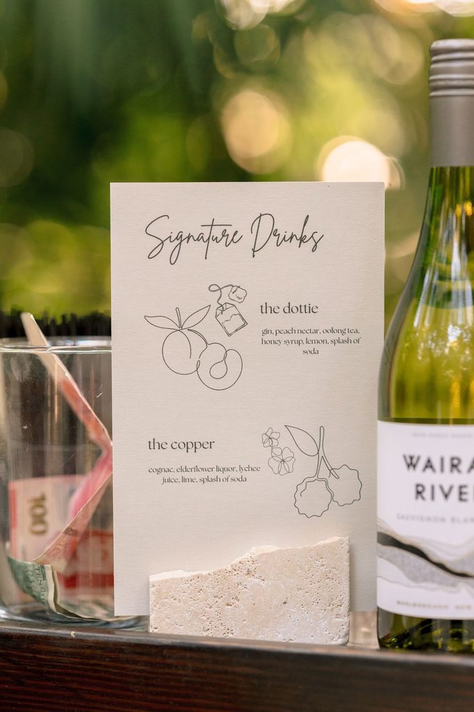Signature drinks card and wine at the reception bar